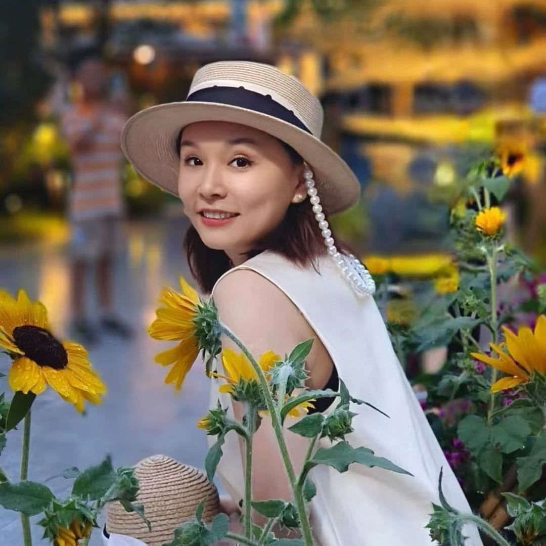王美荔.