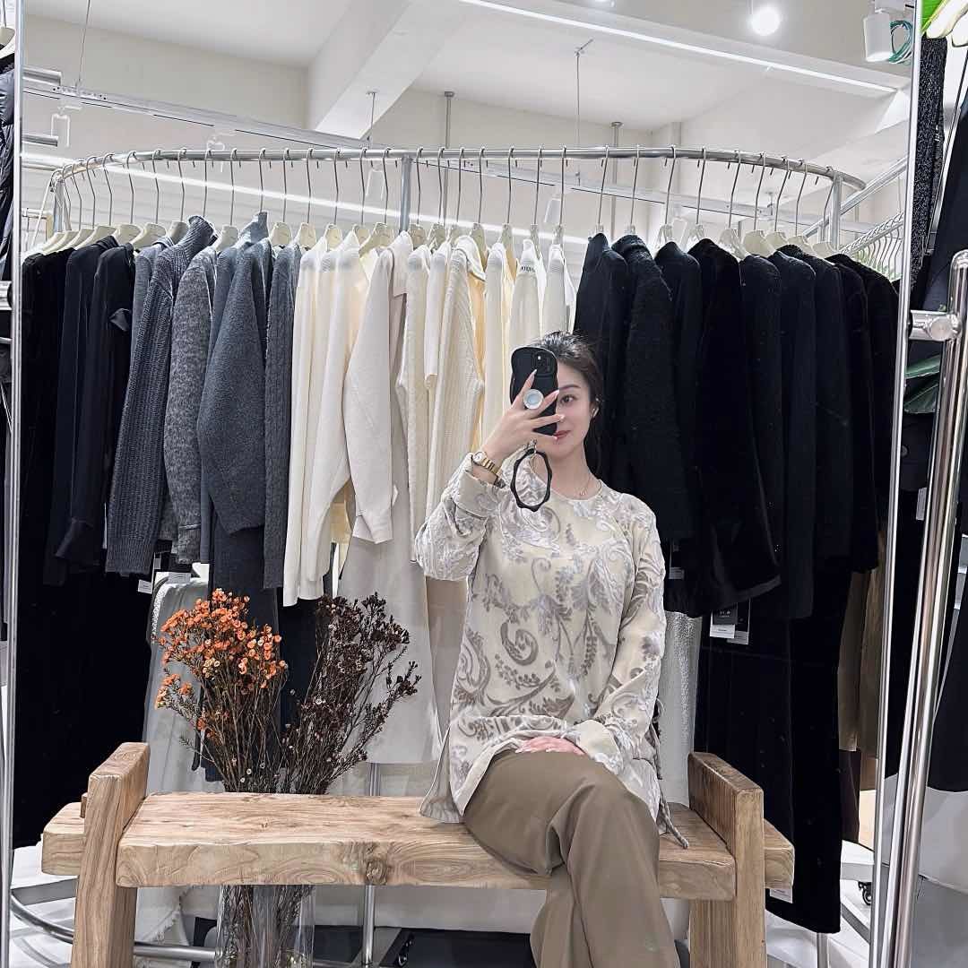 俊.十里精品女装