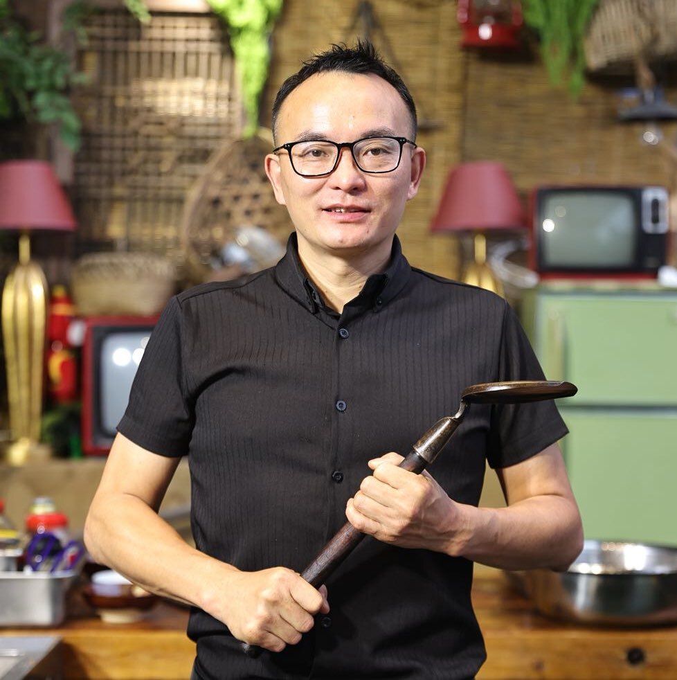 做重庆菜的周勇