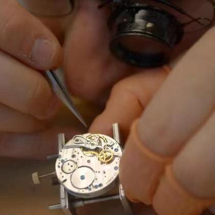 腕上修表师邱师傅