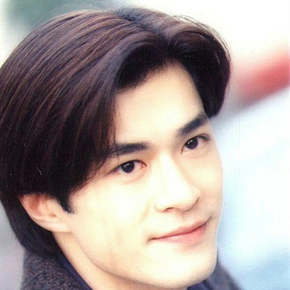 罗